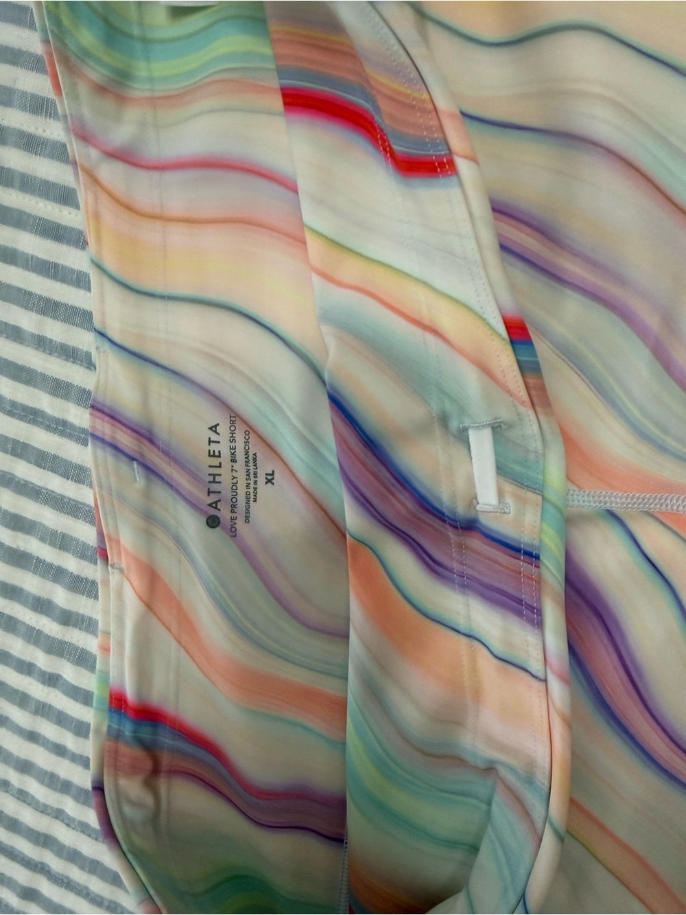 Athleta Pastel Rainbow Wave bike compression shorts.